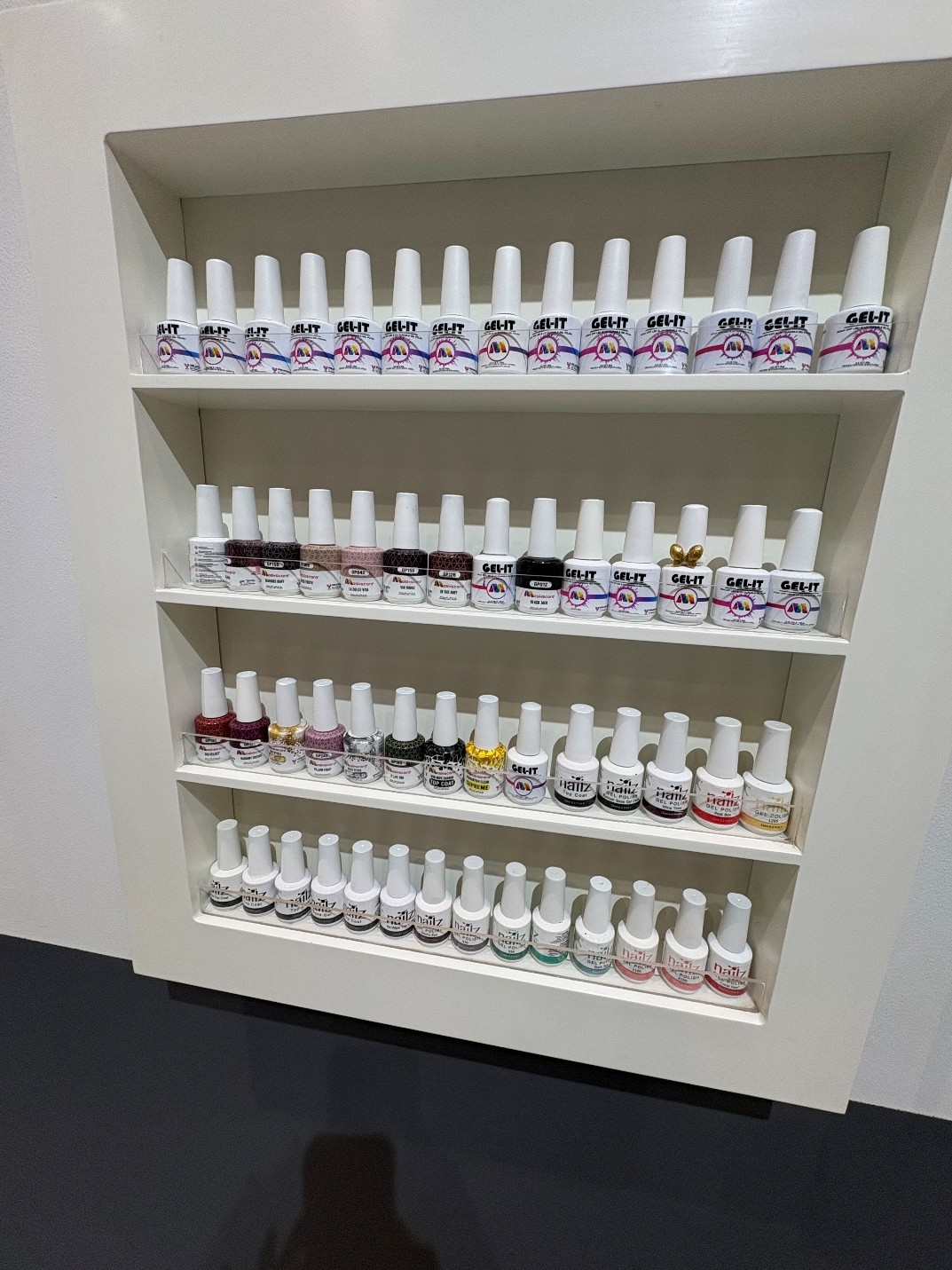 Gel polish colour wall in the studio