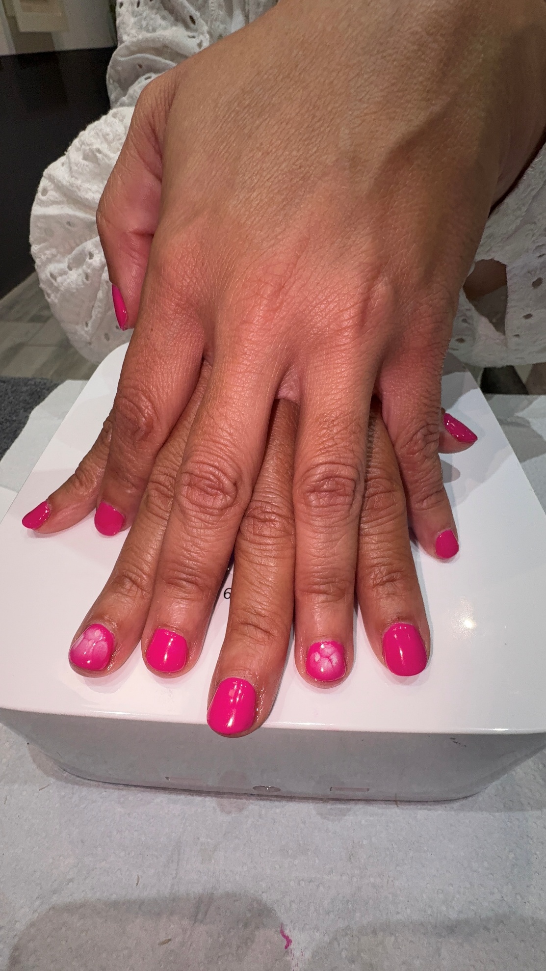 Bright pink gel polish manicure